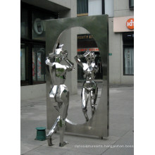 Modern mirror of a women stainless steel sculpture